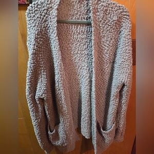 The Zenana Cardigan Sweater is a stylish and comfortable plus-size sweater 2x